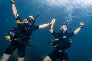 Koh Tao divers celebrating underwater