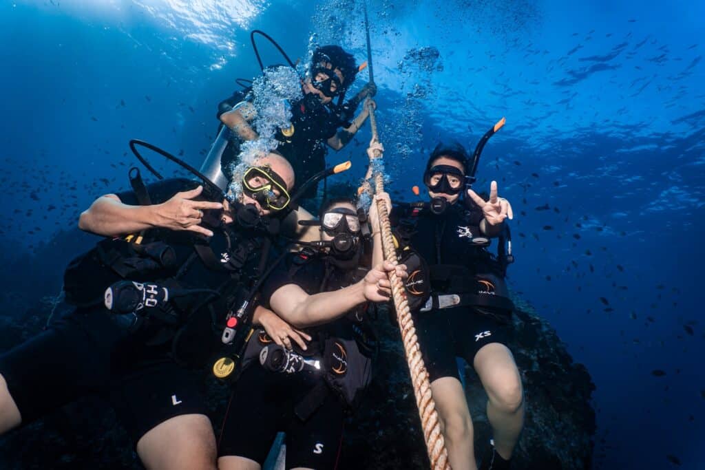 Divers descending on the deep dive of the advanced course