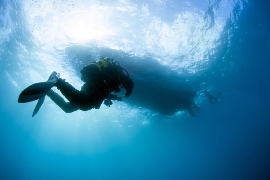 A deep diver ascending to the boat on Koh Tao